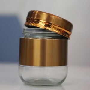 Glass jar with cover coated plastic cover