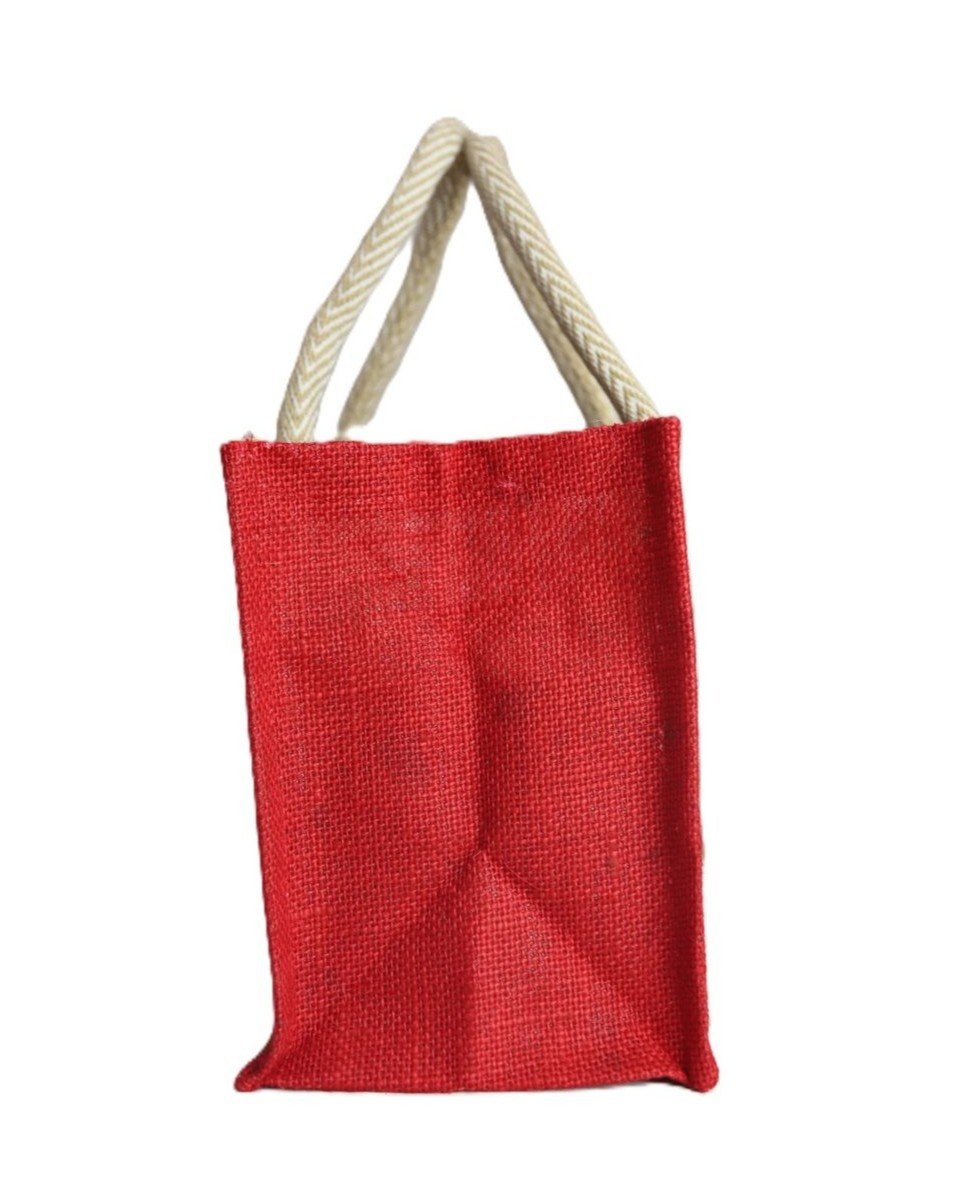 Handcrafted Jute Tote Bag with clothes - Image 3