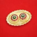 oval-shaped kumkum holder