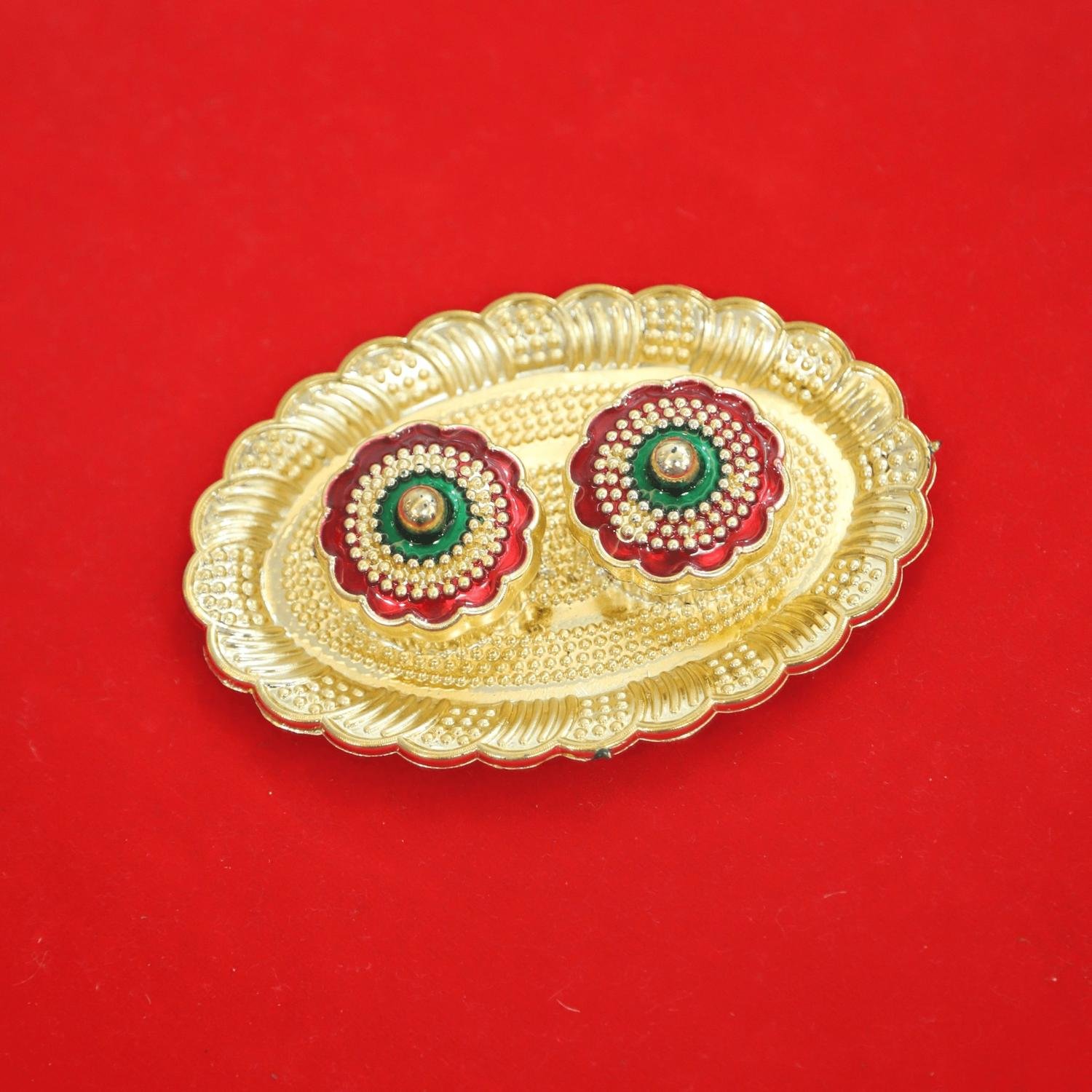 oval-shaped kumkum holder