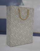 White & gold floral design paper bag