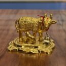 Kamadhenu statue golden finish