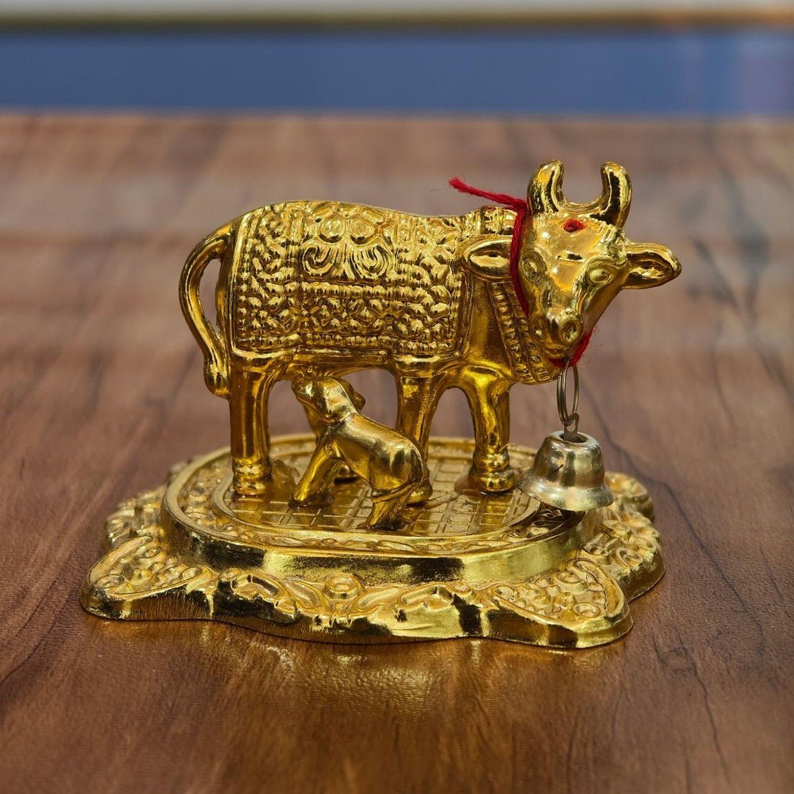 Kamadhenu statue golden finish
