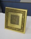 large wooden manai with golden finish