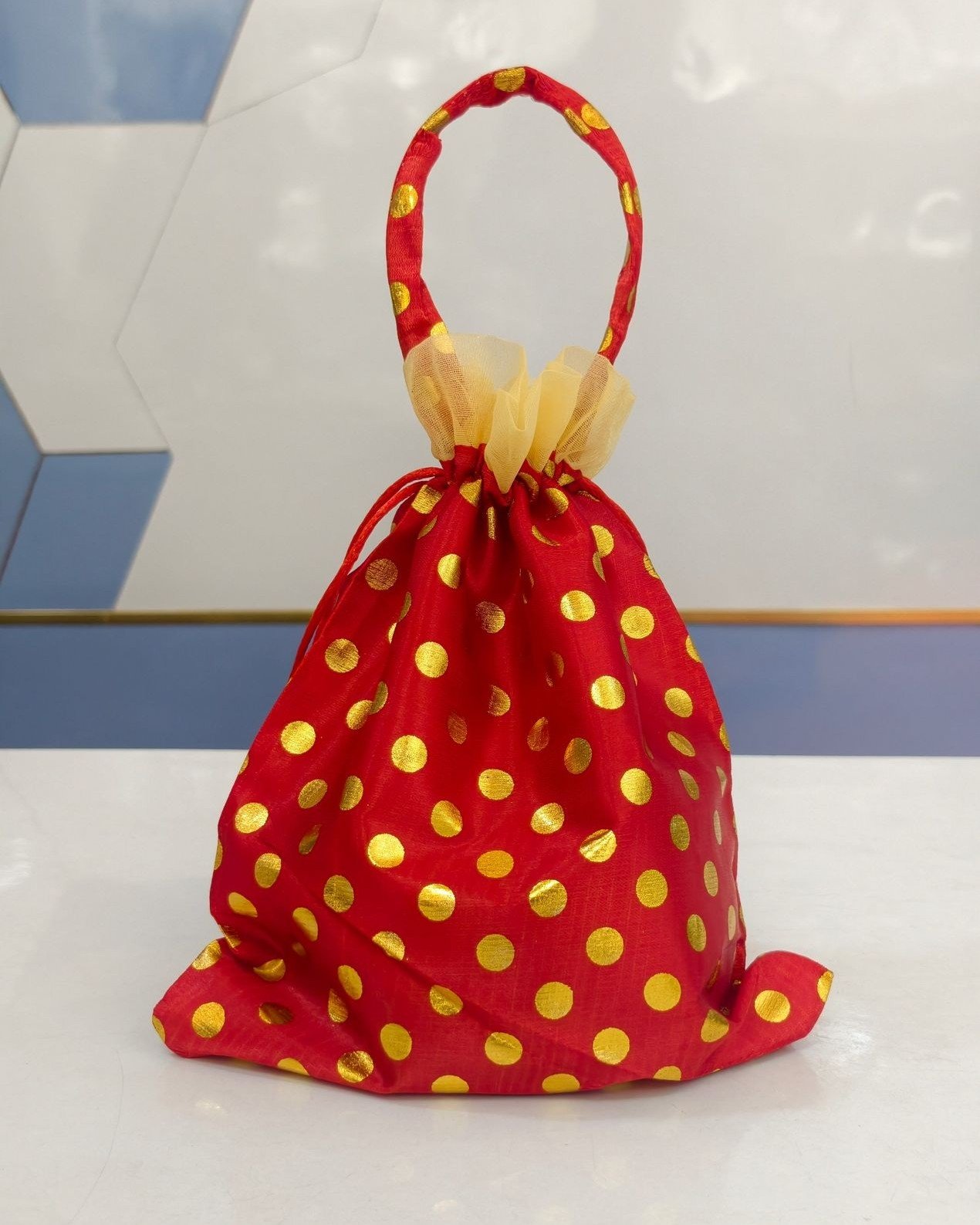 Designer potli bag with handle
